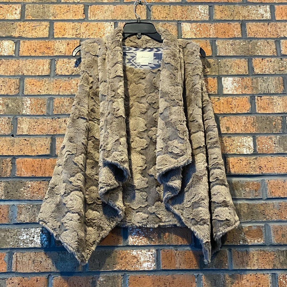 TAN VEST